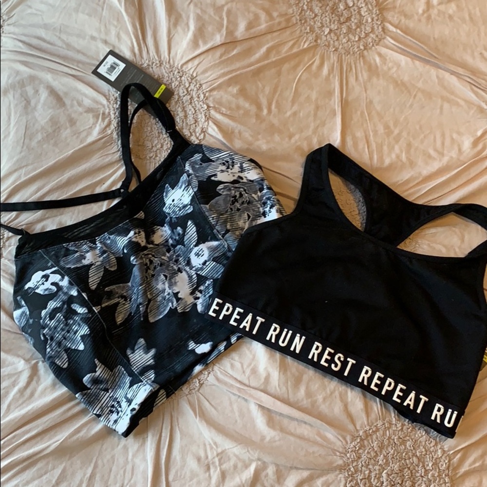 Two black and white sports bras